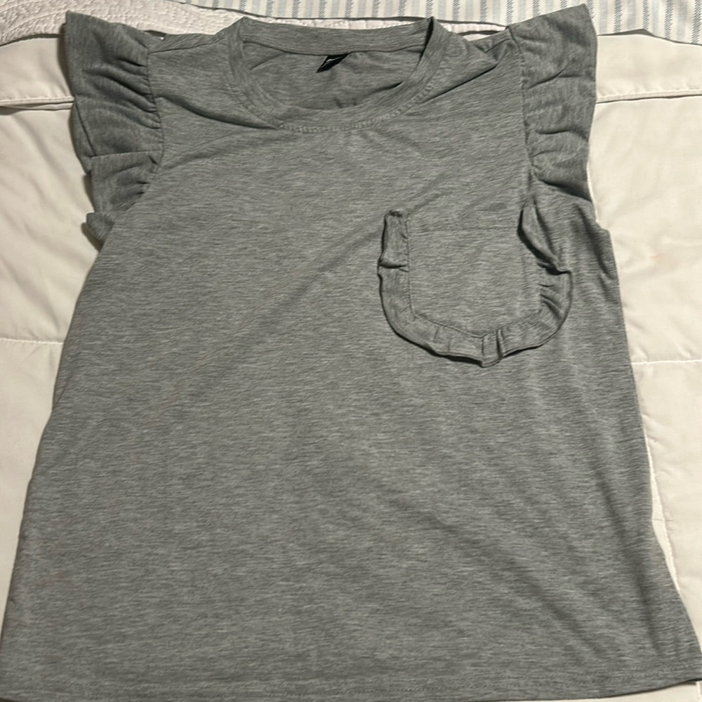 Ruffled short sleeve t-shirt size medium.